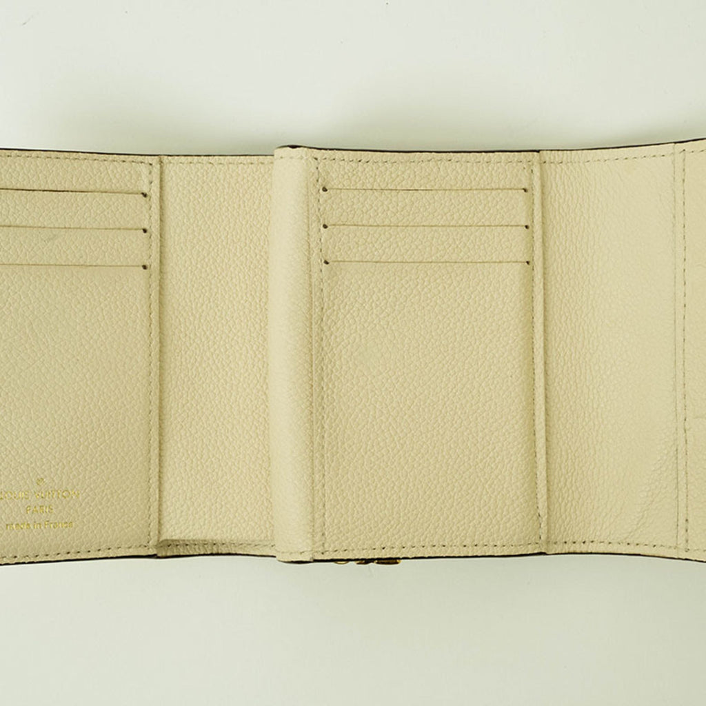 Louis Vuitton Cream Monogram Empreinte Leather Wallet