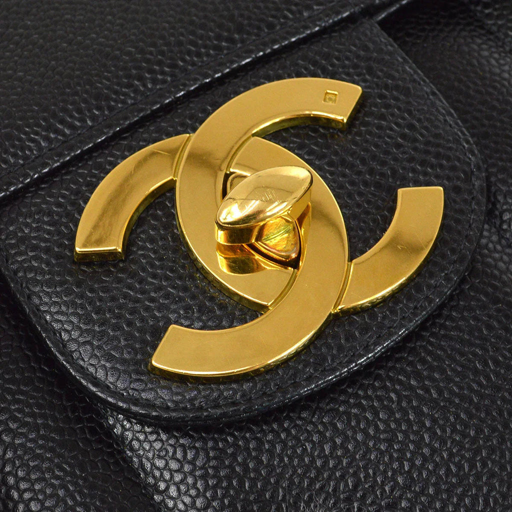 Chanel * 1994-1996 Black Caviar Jumbo Vertical Stitch Classic Flap