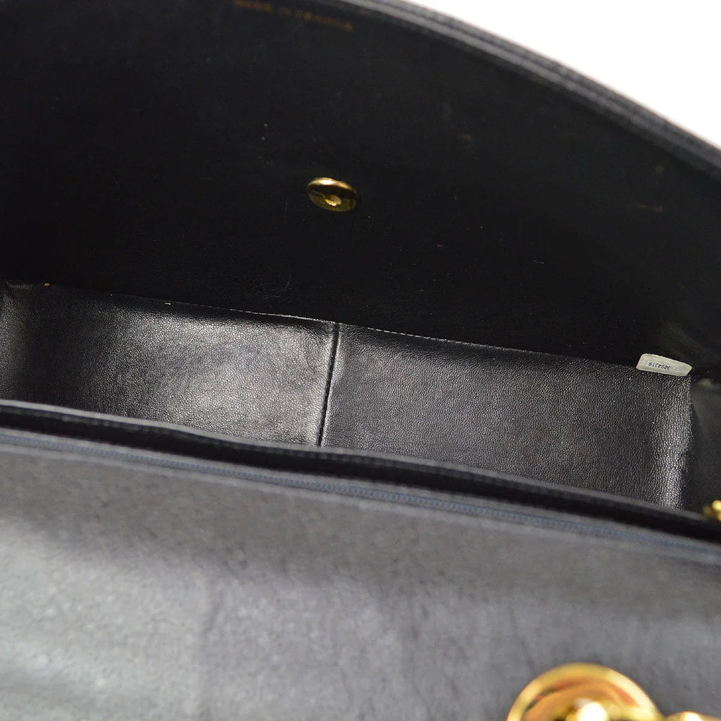 Chanel * 1994-1996 Black Caviar Jumbo Vertical Stitch Classic Flap
