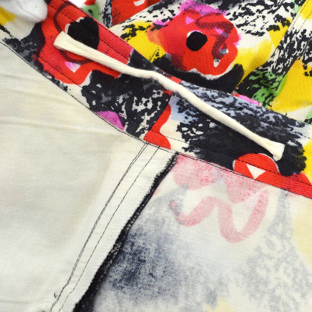 Chanel 1997 Spring camellia-print slim-cut trousers #38