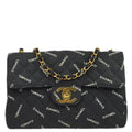 Chanel 1994-1996 Black Canvas Maxi Classic Flap Shoulder Bag