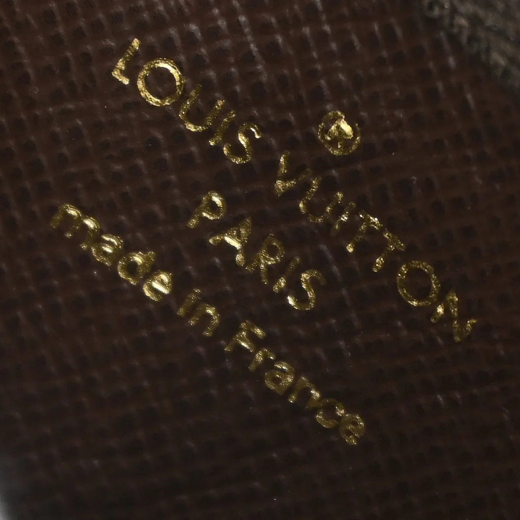 Louis Vuitton 2009 Monogram Mini Lin Pochette Cles Coin Case M95230