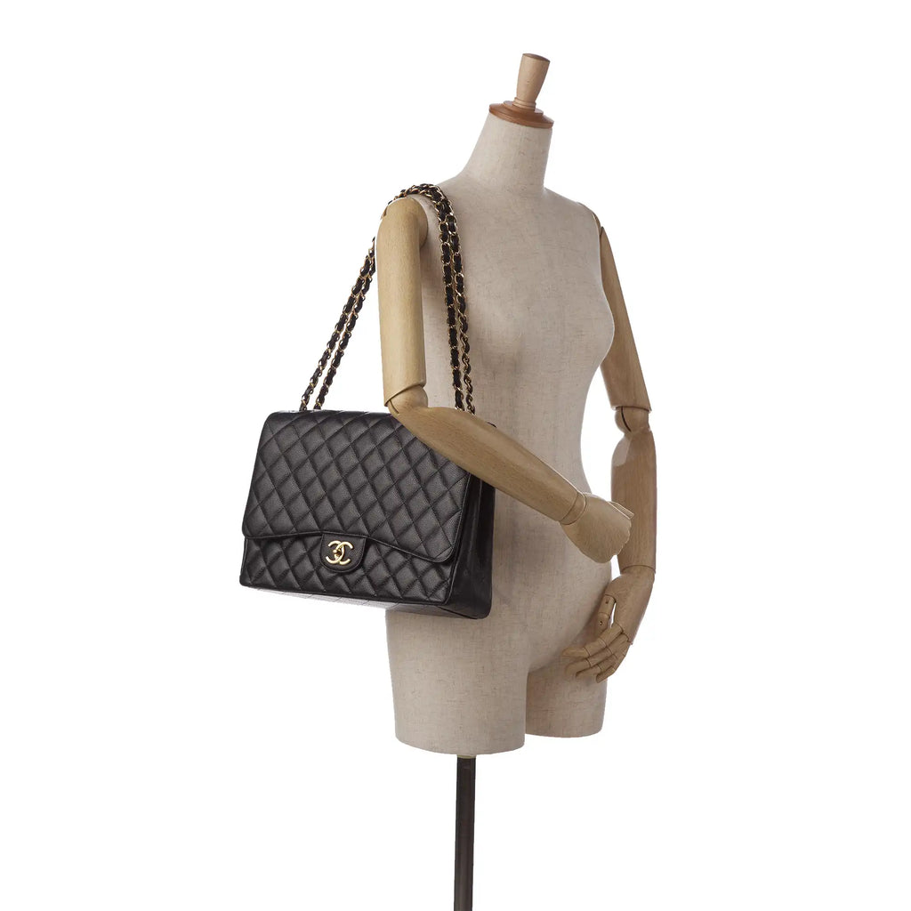 Chanel Classic Double Flap Maxi Black Caviar Gold