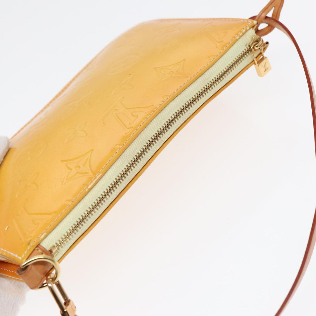Louis Vuitton Lexington   Leather Clutch Bag