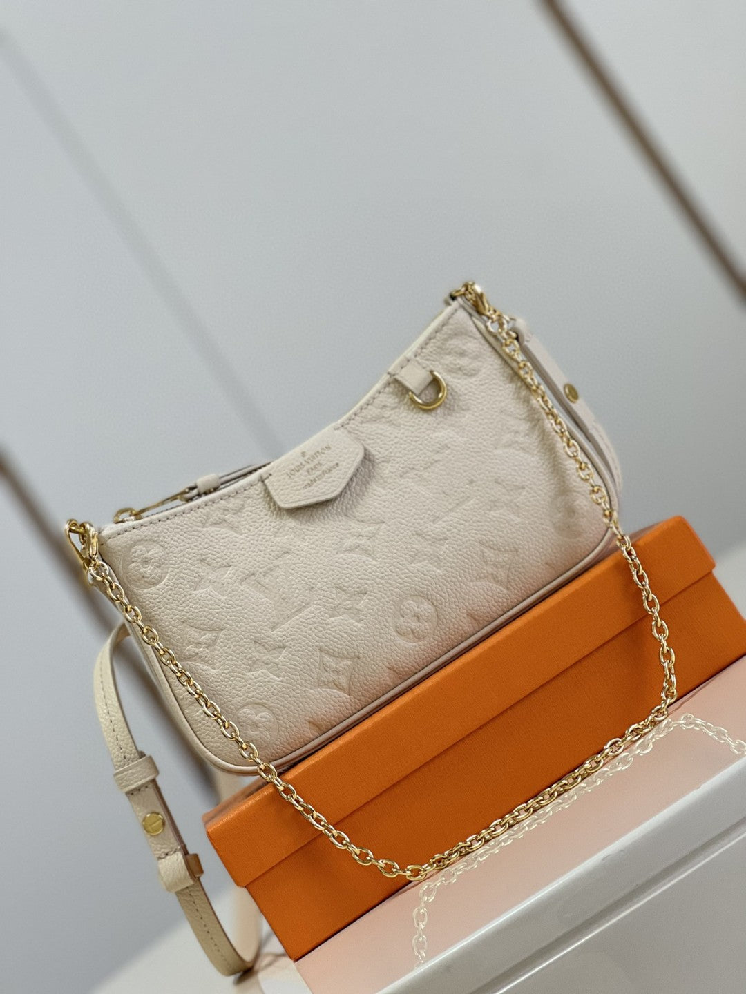 Louis Vuitton Easy Pouch On Strap Monogram Empreinte CrÃƒÆ’Ã‚Â¨me White For Spring, WomenÃƒÂ¢Ã¢â€šÂ¬Ã¢â€žÂ¢s Handbags, Shoulder Bags 7.5in/19cm Louis Vuitton M81066