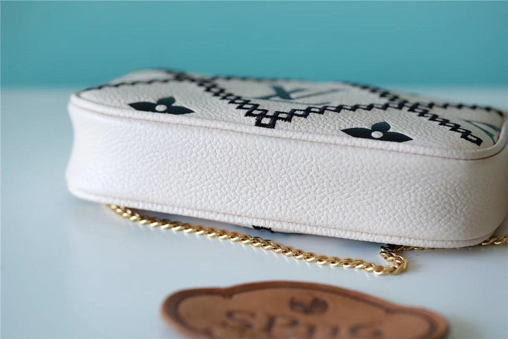 Louis Vuitton Mini Pochette AcGLAMIssoires Monogram Empreinte White For Women, WomenÃƒÂ¢Ã¢â€šÂ¬Ã¢â€žÂ¢s Handbags, Shoulder Bags And Crossbody Bags 6.1in/15.5cm Louis VuittonÃƒâ€šÃ‚Â 