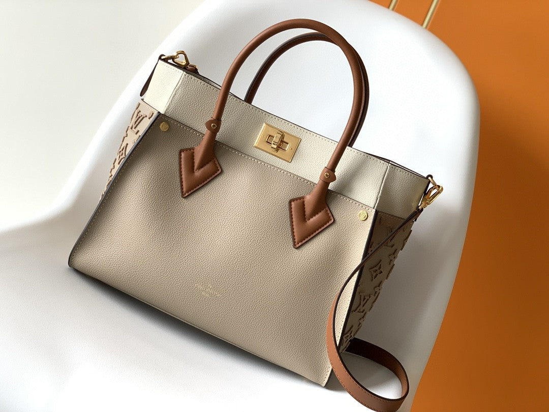 Louis Vuitton On My Side MM Tote Bag Monogram Tufting On Nappa Softy For Women,  Shoulder Bags 12in/31cm Galet Grey Louis Vuitton M53825