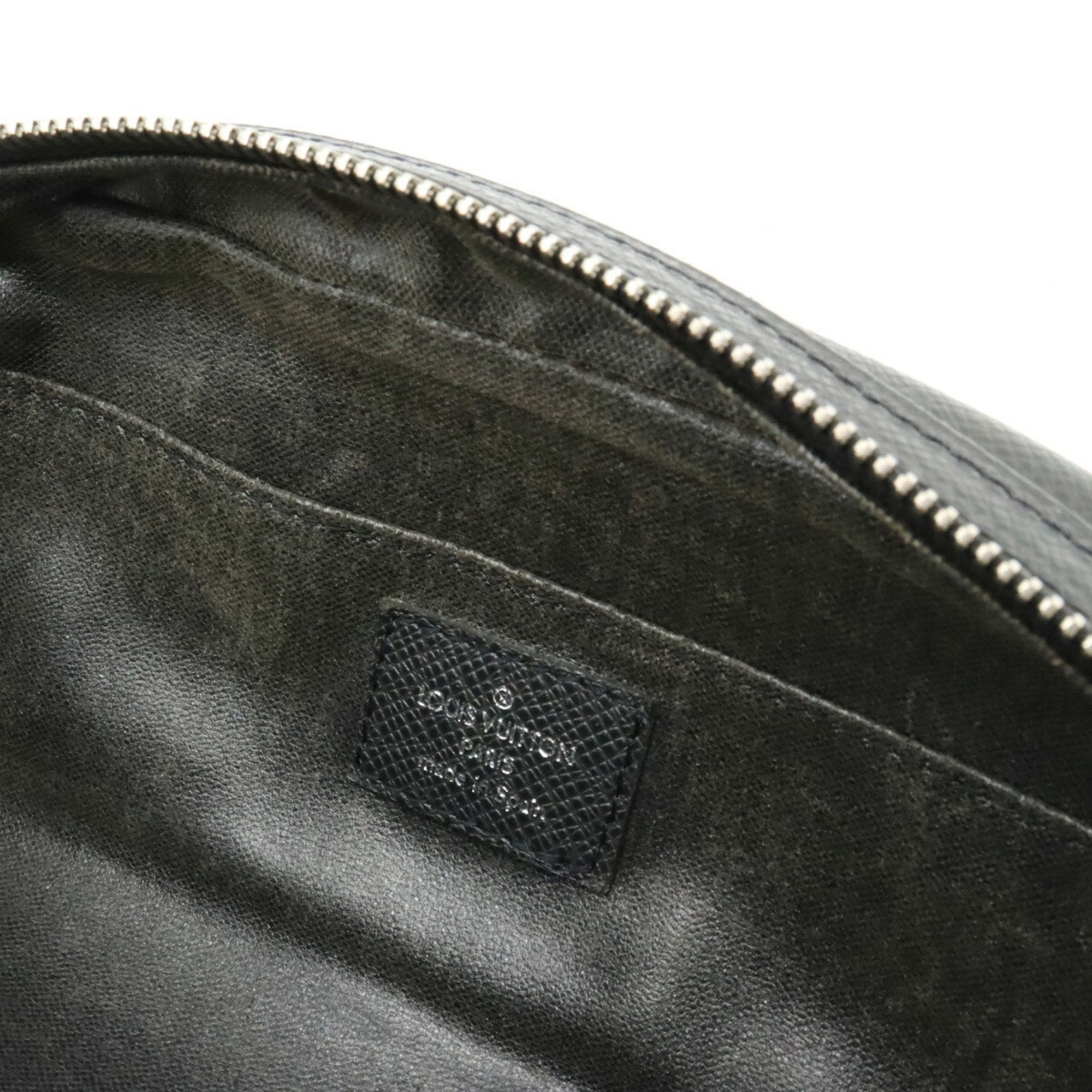 Louis Vuitton Trousse Ivan  Leather Clutch Bag