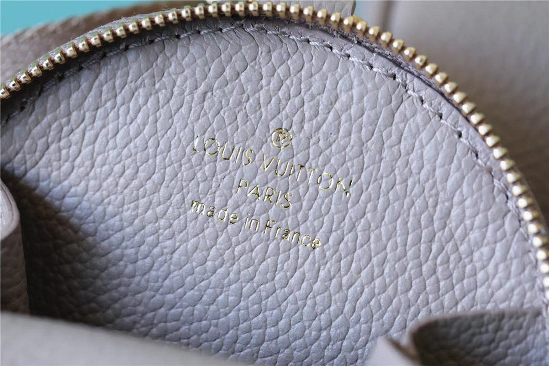 Louis Vuitton Papillon Monogram Empreinte Tourterelle / Creme Beige For Women, WomenÃƒÂ¢Ã¢â€šÂ¬Ã¢â€žÂ¢s Handbags, Shoulder Bags And Crossbody Bags 7.9in/20cm Louis Vuitton M46031