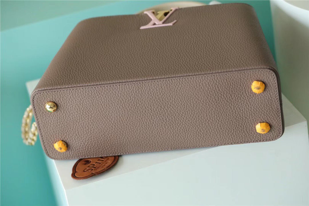 Louis Vuitton Capucines MM Taurillon Smokey Brown Green/ Creme/ Pink For Women, WomenÃƒÂ¢Ã¢â€šÂ¬Ã¢â€žÂ¢s Bags, Shoulder And Crossbody Bags 12.4in/31.5cm Louis Vuitton M59516