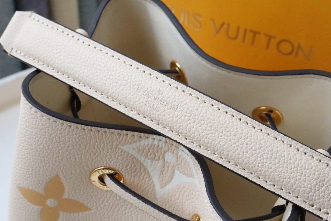 Louis Vuitton NeoNoe BB Bucket Bag Monogram Empreinte Cream/Saffron For Women, Women’s Bags, Shoulder Bags 7.9in/20cm Louis Vuitton M45716