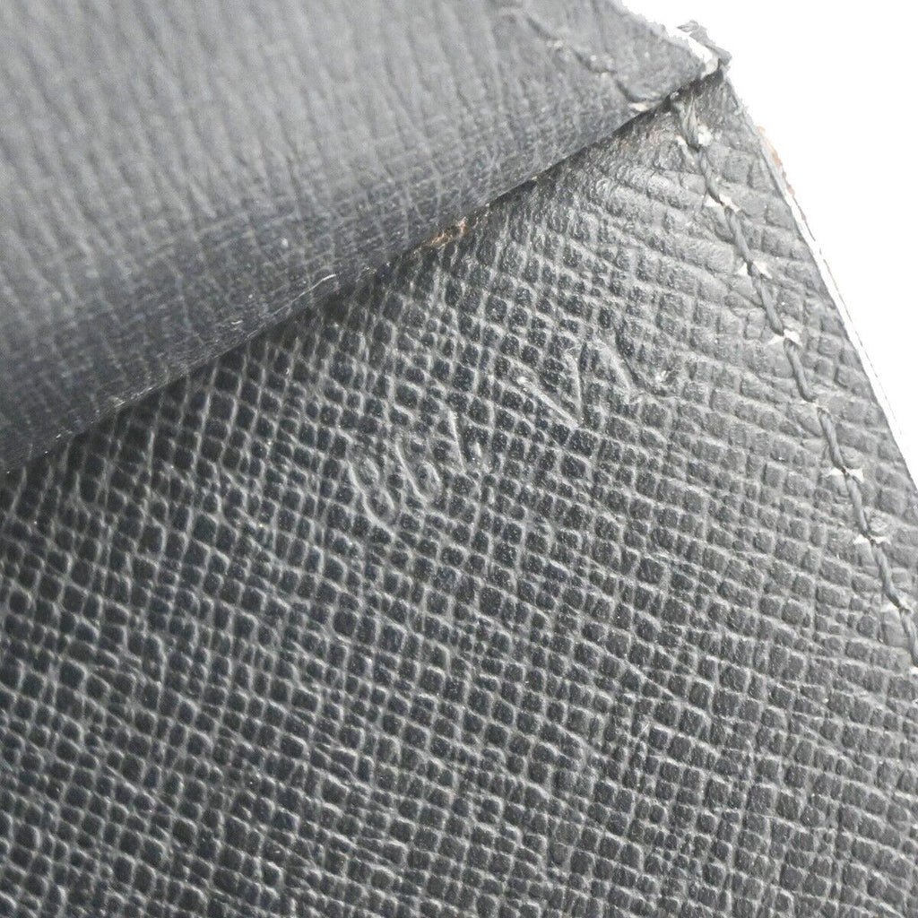 Louis Vuitton Montaigne  Leather Clutch Bag