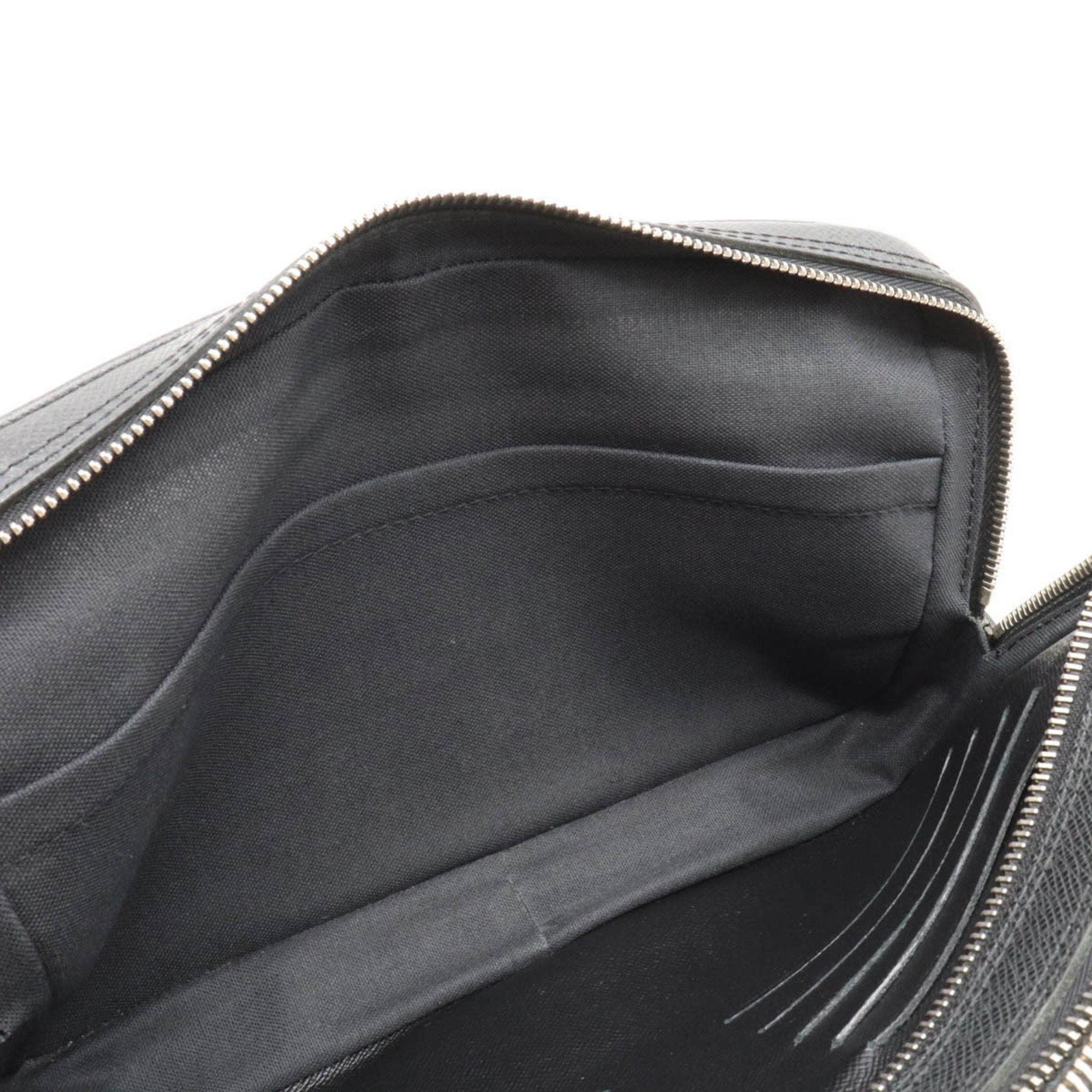 Louis Vuitton Pavel  Leather Clutch Bag