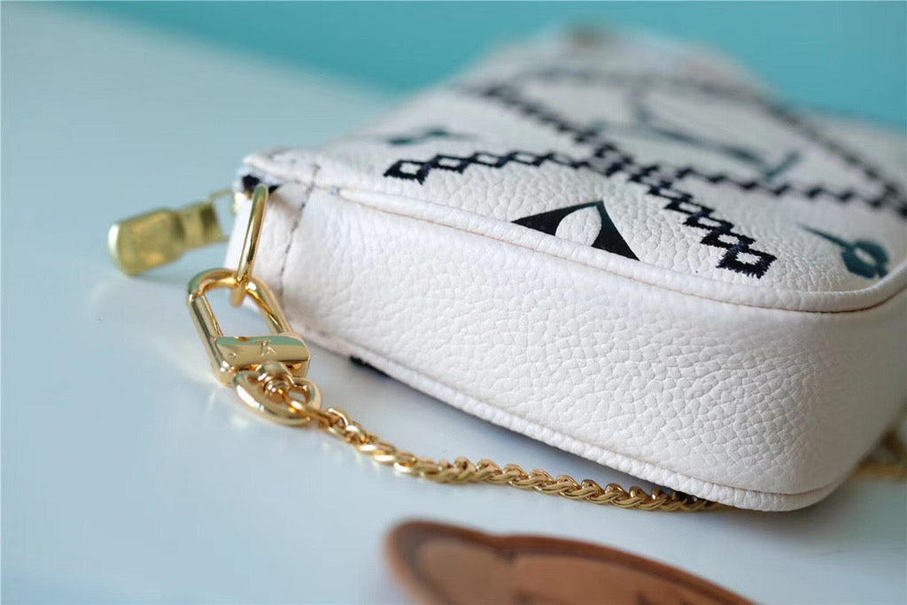 Louis Vuitton Mini Pochette AcGLAMIssoires Monogram Empreinte White For Women, WomenÃƒÂ¢Ã¢â€šÂ¬Ã¢â€žÂ¢s Handbags, Shoulder Bags And Crossbody Bags 6.1in/15.5cm Louis VuittonÃƒâ€šÃ‚Â 