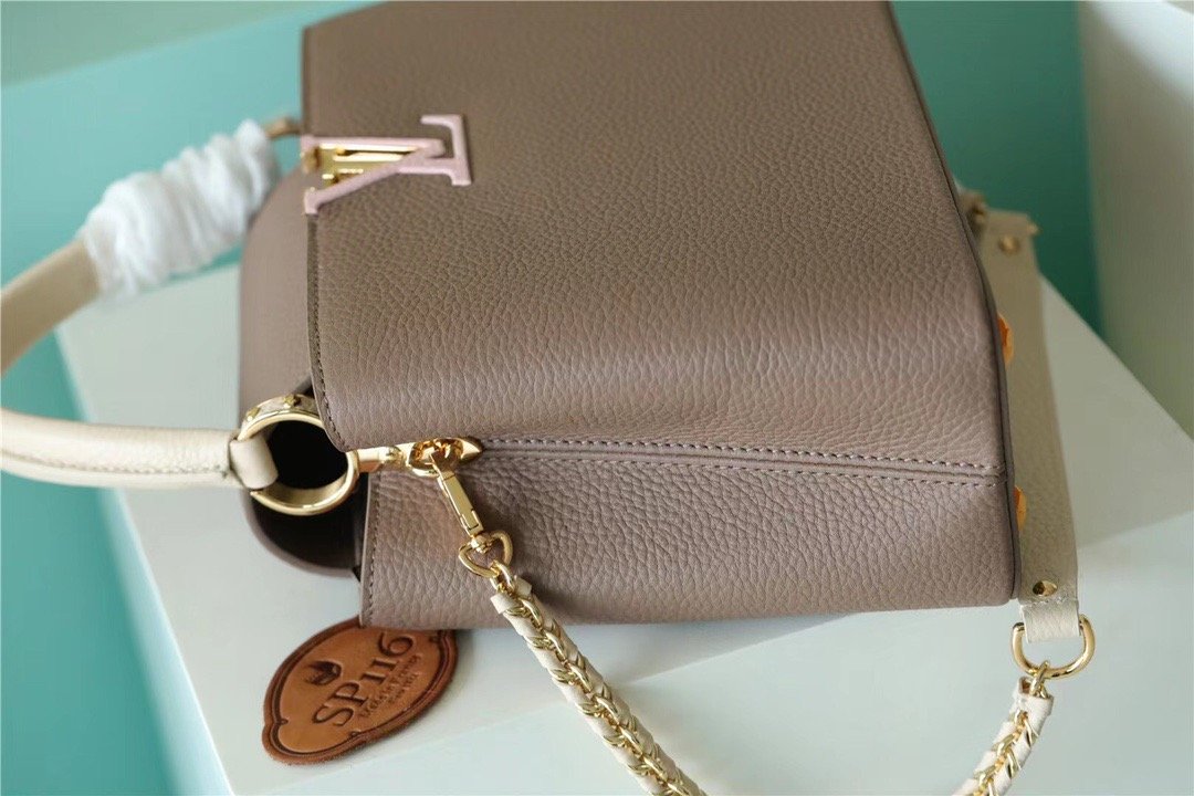 Louis Vuitton Capucines MM Taurillon Smokey Brown Green/ Creme/ Pink For Women, WomenÃƒÂ¢Ã¢â€šÂ¬Ã¢â€žÂ¢s Bags, Shoulder And Crossbody Bags 12.4in/31.5cm Louis Vuitton M59516