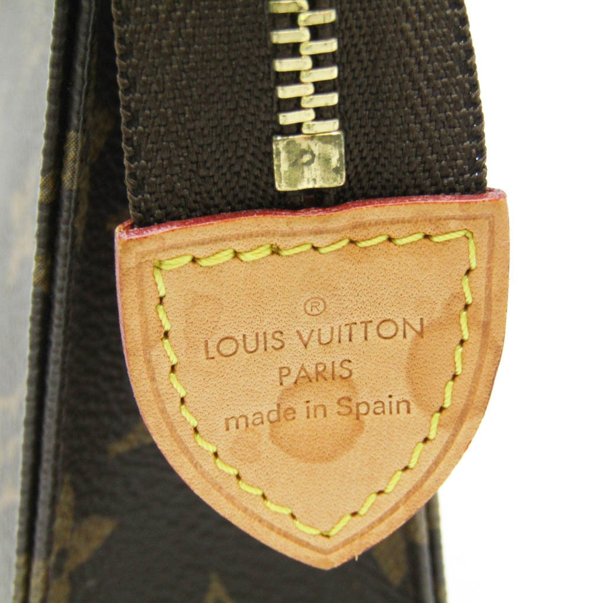Louis Vuitton Trousse De Toilette  Canvas Clutch Bag