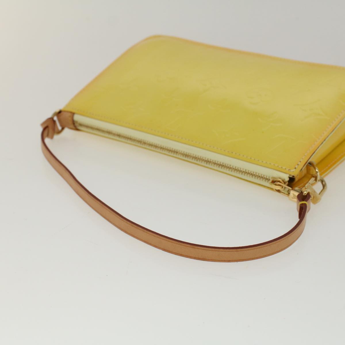 Louis Vuitton Lexington   Leather Clutch Bag