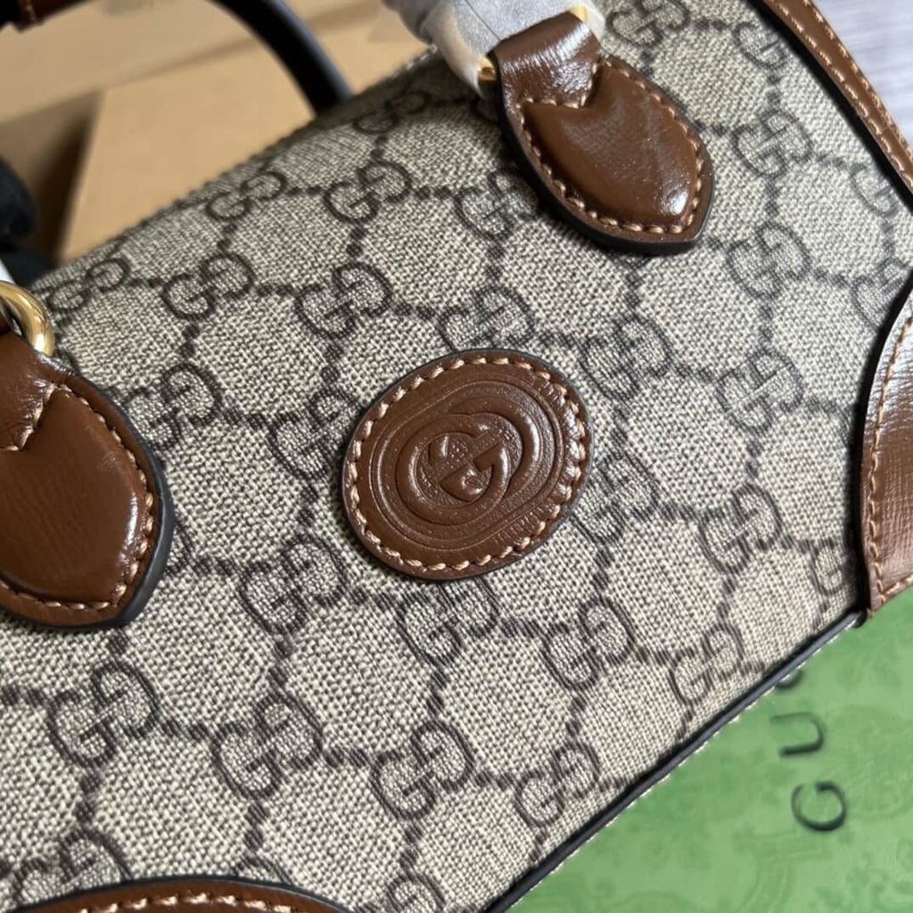 GC 723307 Travelling bag PM Supreme 21.5CM brown