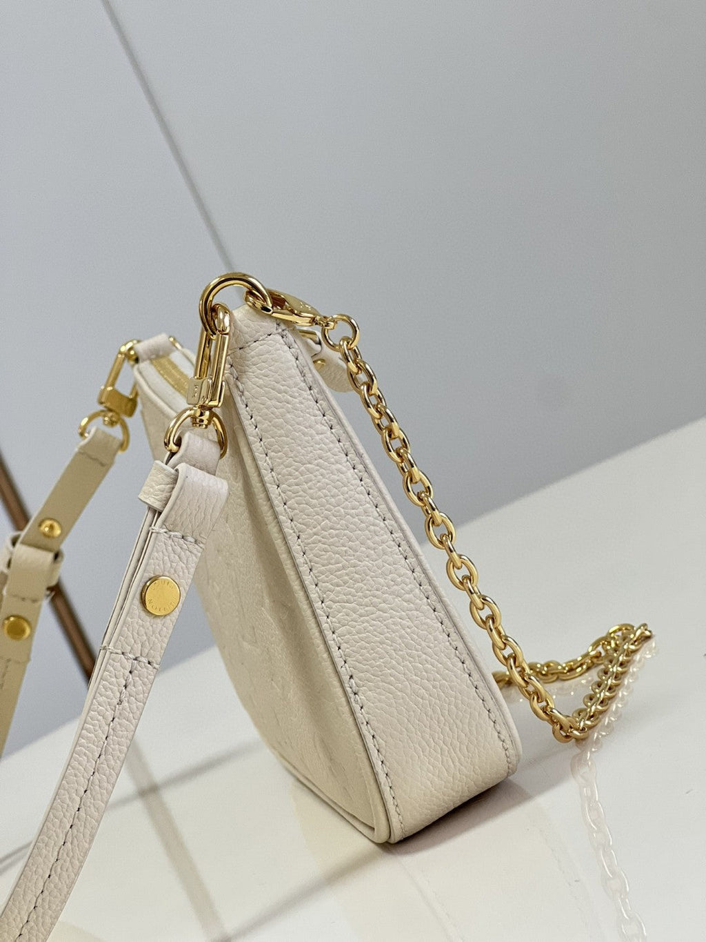 Louis Vuitton Easy Pouch On Strap Monogram Empreinte Crème White For Spring, Women’s Handbags, Shoulder Bags 7.5in/19cm Louis Vuitton M81066