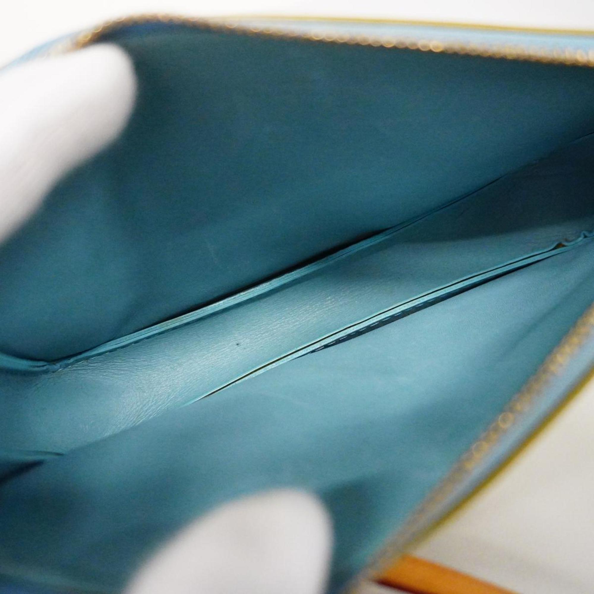 Louis Vuitton Lexington   Leather Clutch Bag