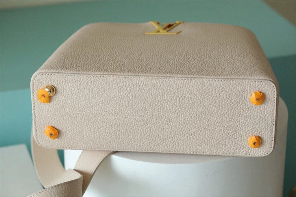 Louis Vuitton Capucines MM Taurillon Creme Beige/ Plume Yellow Berlingot For Women, WomenÃƒÂ¢Ã¢â€šÂ¬Ã¢â€žÂ¢s Bags, Shoulder And Crossbody Bags 12.4in/31.5cm Louis Vuitton M59883