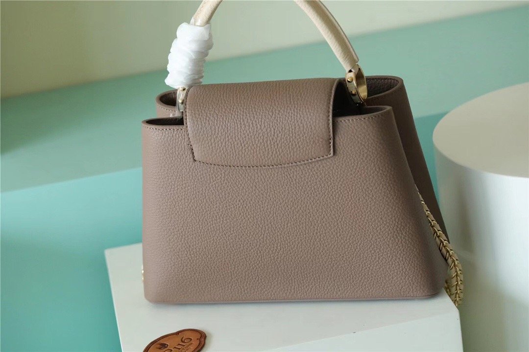 Louis Vuitton Capucines MM Taurillon Smokey Brown Green/ Creme/ Pink For Women, WomenÃƒÂ¢Ã¢â€šÂ¬Ã¢â€žÂ¢s Bags, Shoulder And Crossbody Bags 12.4in/31.5cm Louis Vuitton M59516