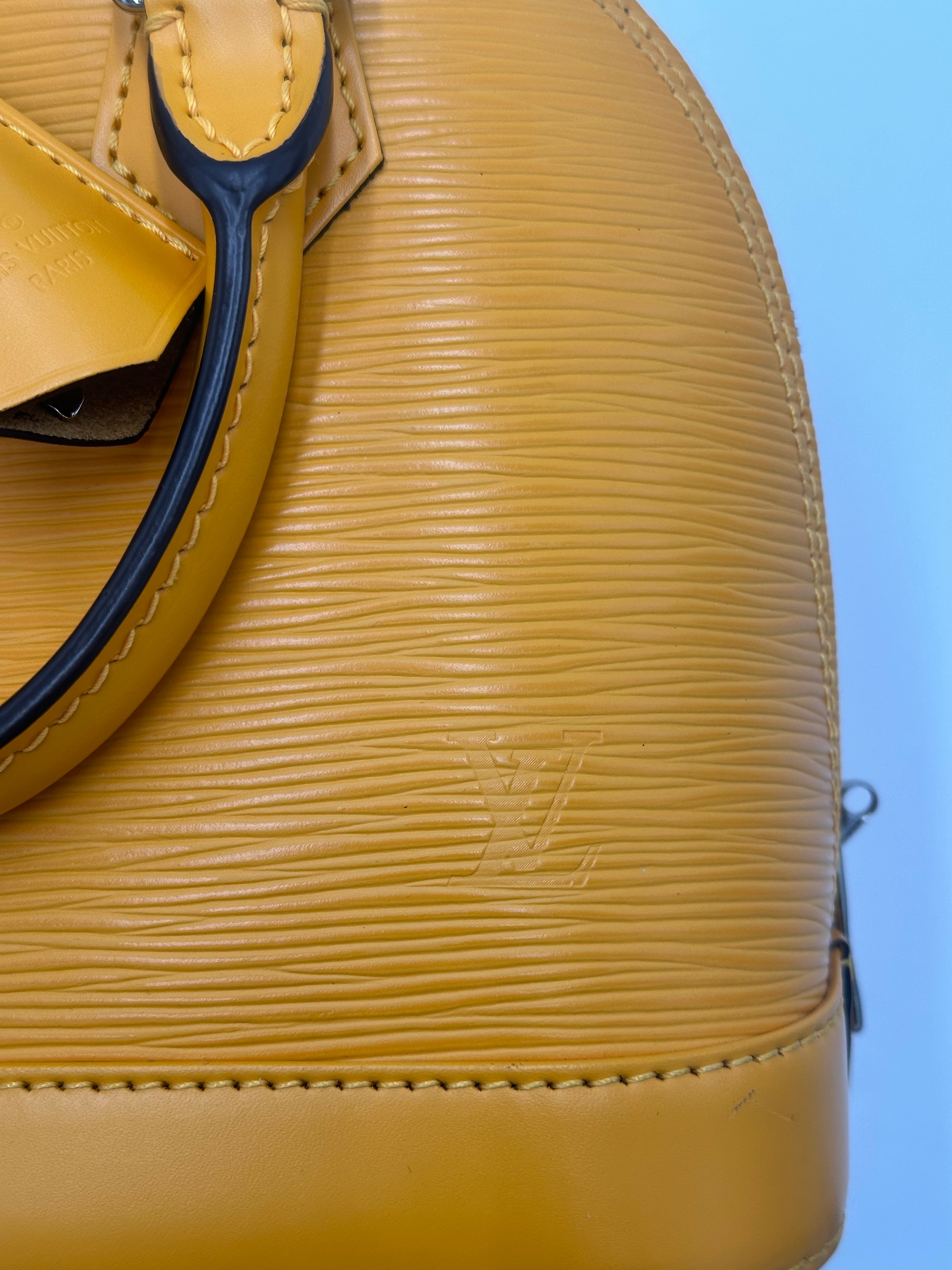 Louis Vuitton Alma Handbag Epi Leather Yellow Leather Handbag