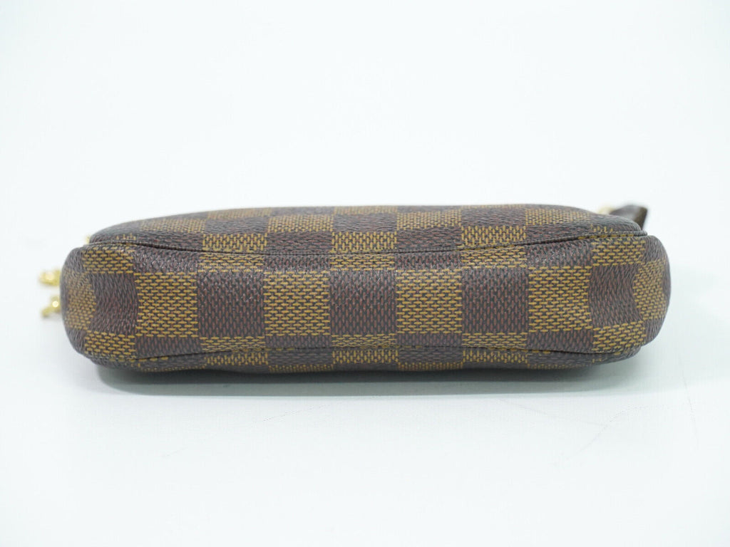 Louis Vuitton Mini Pochette Accessoires  Canvas Clutch Bag