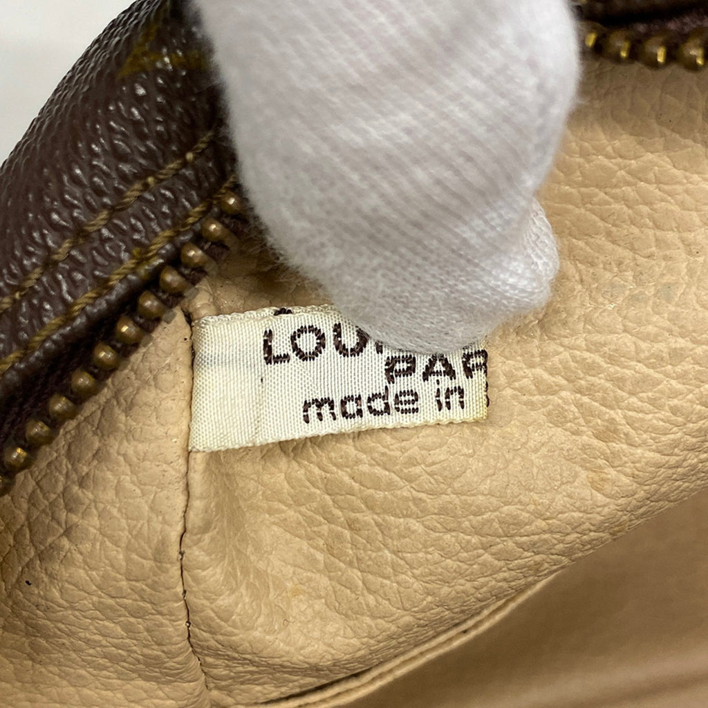 Louis Vuitton Trousse De Toilette  Canvas Clutch Bag