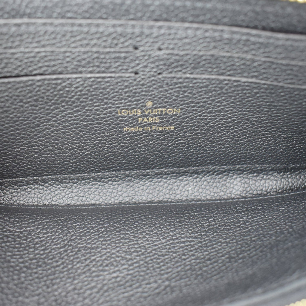 LOUIS VUITTON Clemence Empreinte Leather Wallet Black