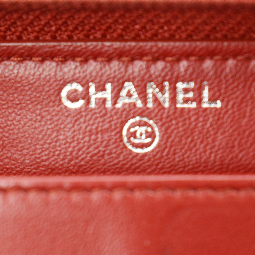 Chanel Zippy Camellia Embossed Leather Wallet Red