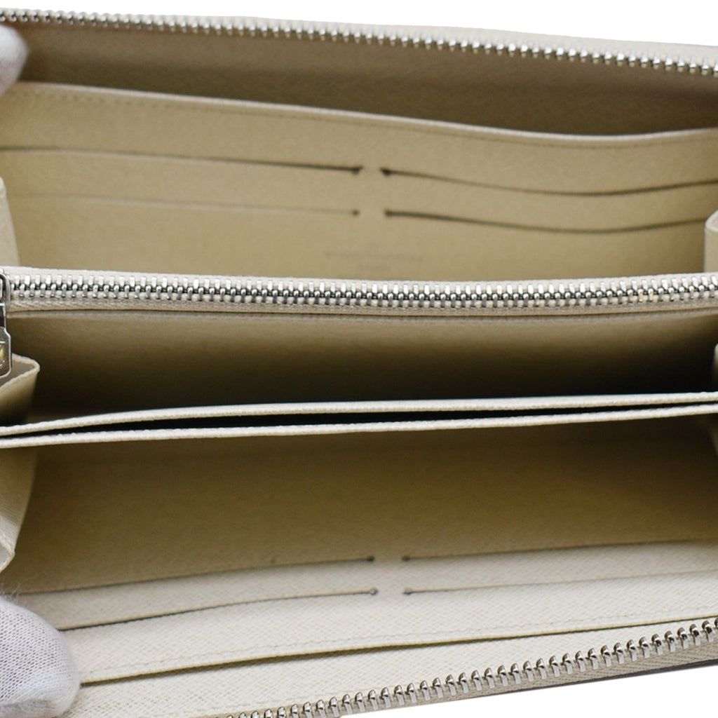 LOUIS VUITTON Epi Leather Zippy Wallet Ivory