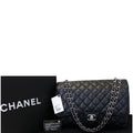 Chanel Maxi Caviar Leather Leather Jumbo Double Flap Shoulder Bag Black