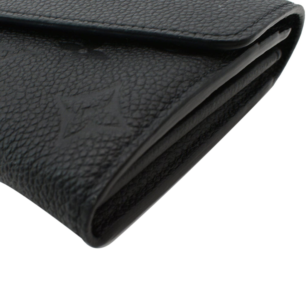 LOUIS VUITTON Sarah Monogram Empreinte Leather Wallet Black