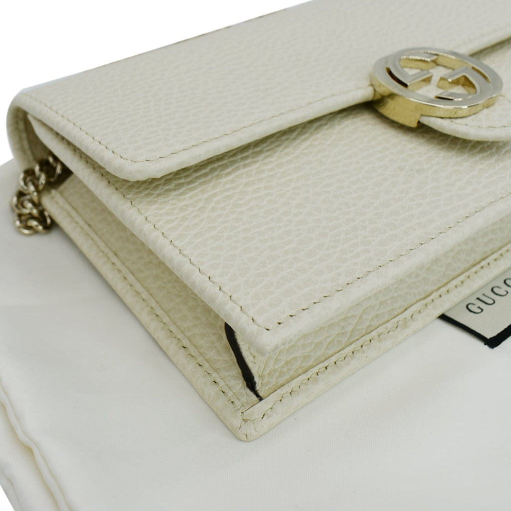 GUCCI Gucci Interlocking Pebbled Leather Crossbody Bag White 615523