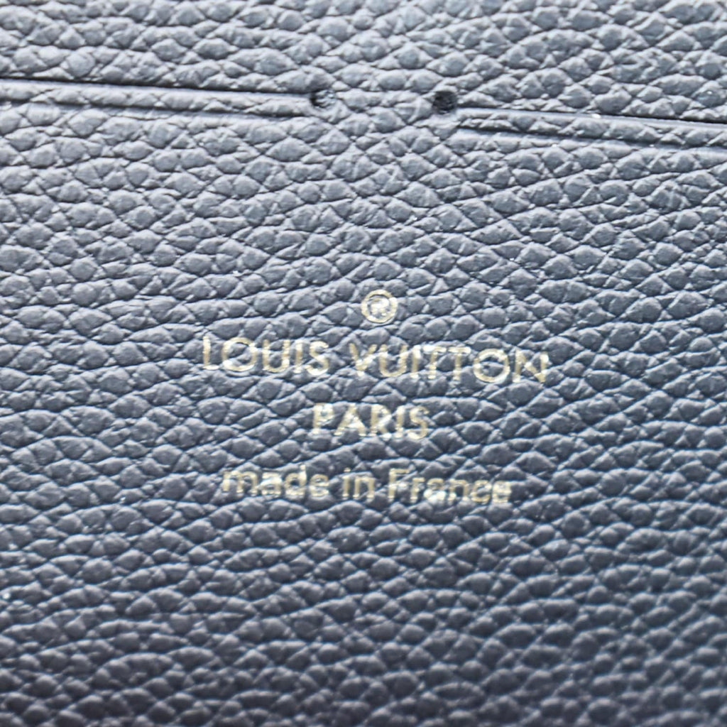 LOUIS VUITTON Clemence Empreinte Leather Wallet Black