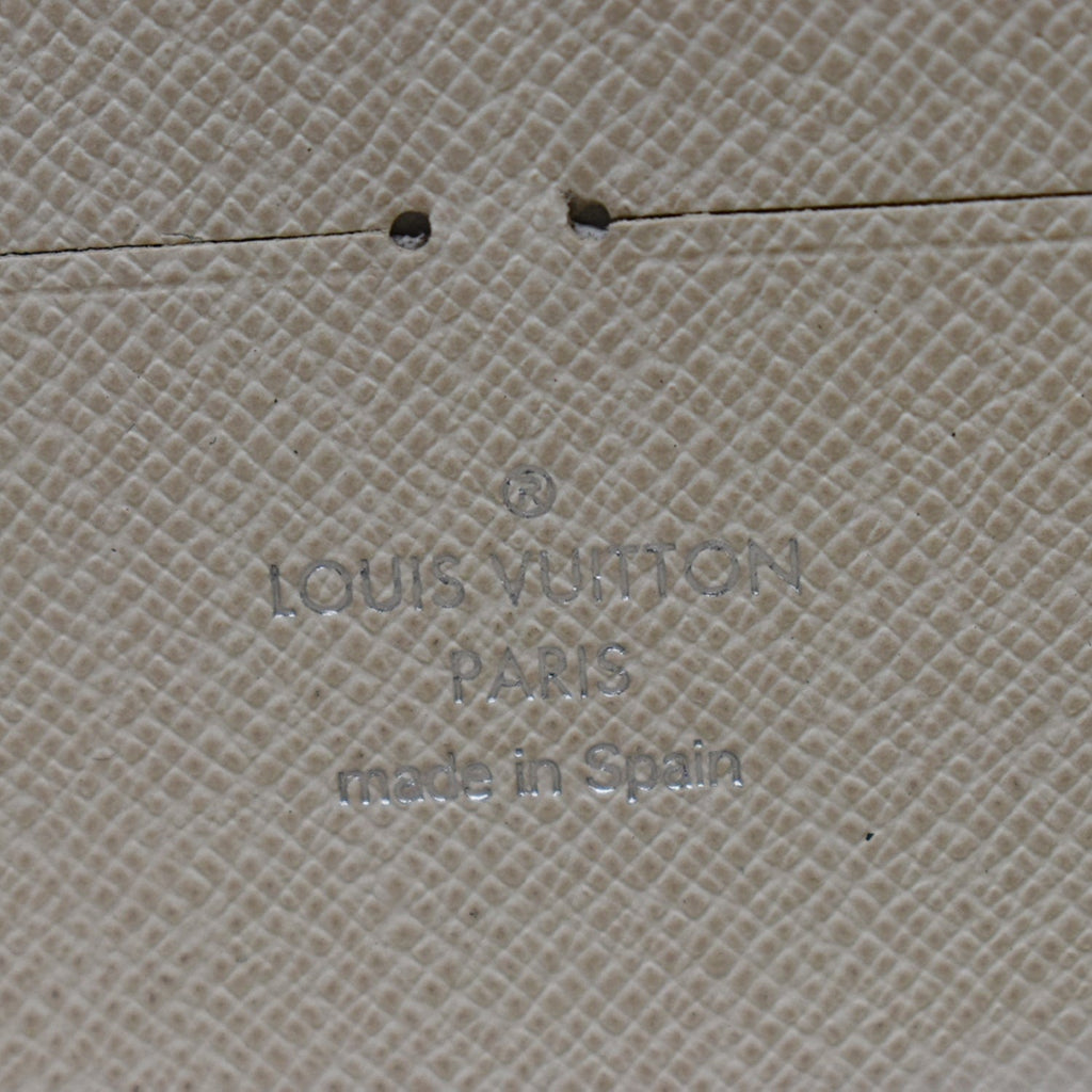 LOUIS VUITTON Epi Leather Zippy Wallet Ivory