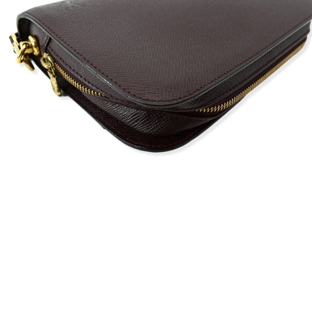 LOUIS VUITTON Orsay Taiga Leather Clutch Bag Purple