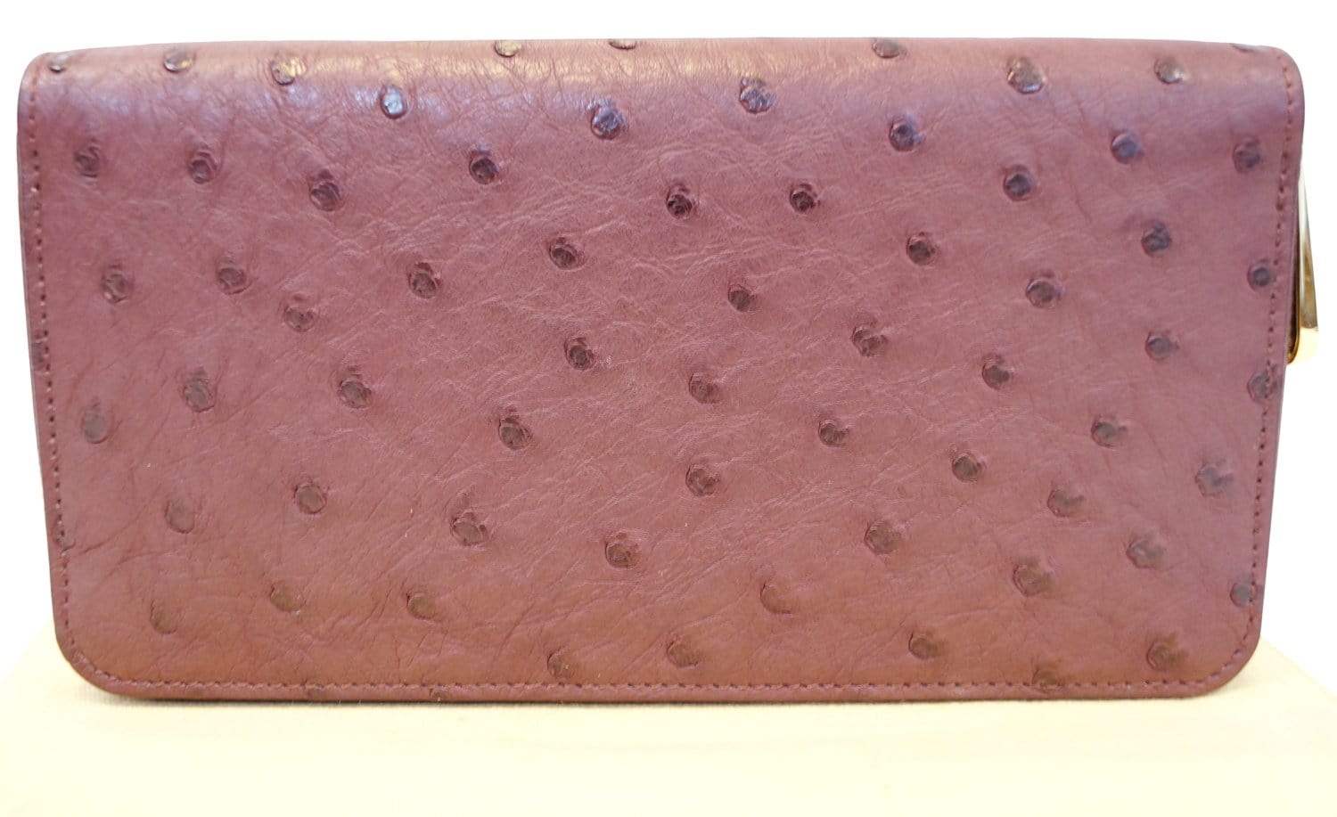 LOUIS VUITTON Burgundy Ostrich Leather Zippy Wallet