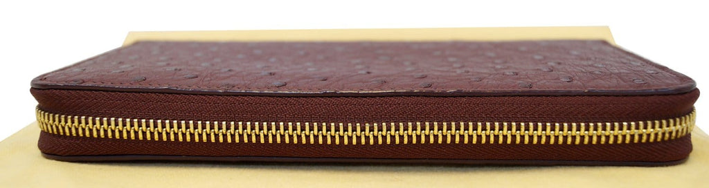 LOUIS VUITTON Burgundy Ostrich Leather Zippy Wallet