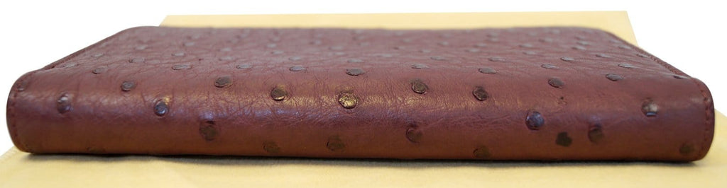 LOUIS VUITTON Burgundy Ostrich Leather Zippy Wallet