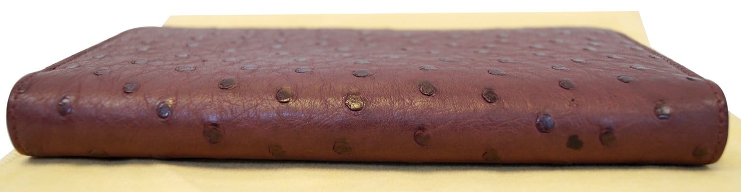LOUIS VUITTON Burgundy Ostrich Leather Zippy Wallet