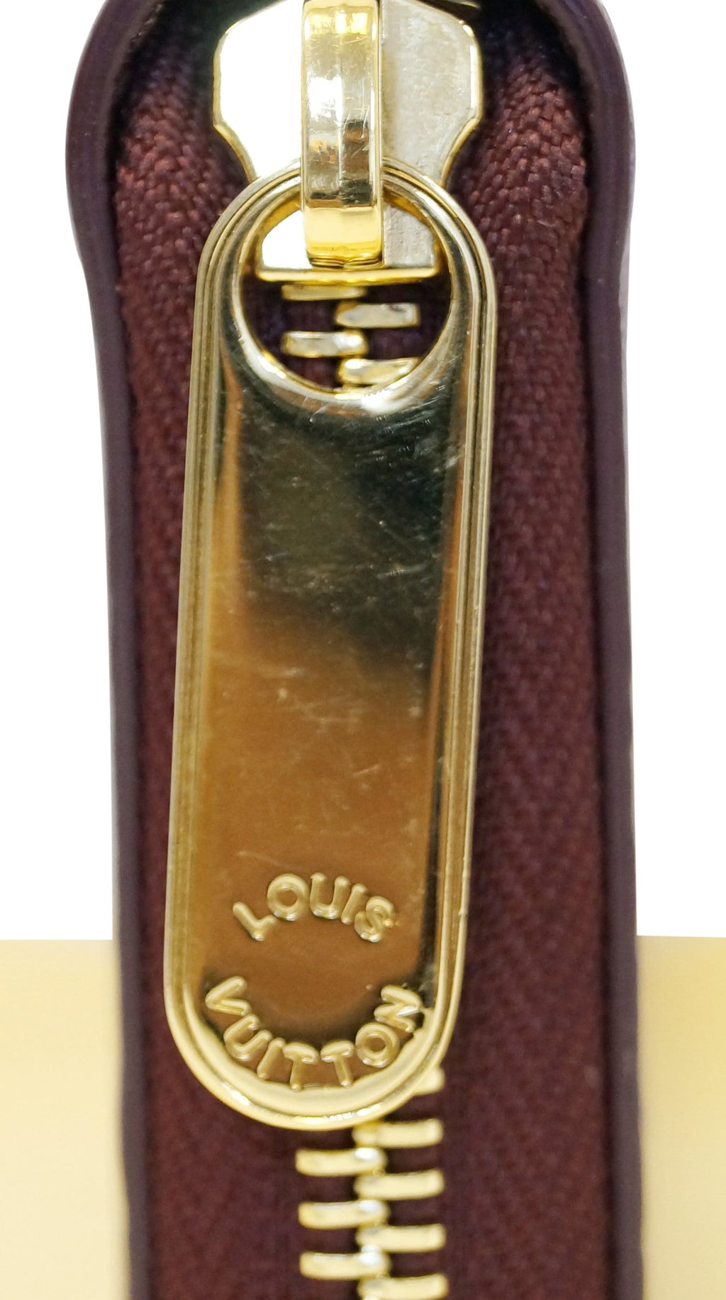 LOUIS VUITTON Burgundy Ostrich Leather Zippy Wallet