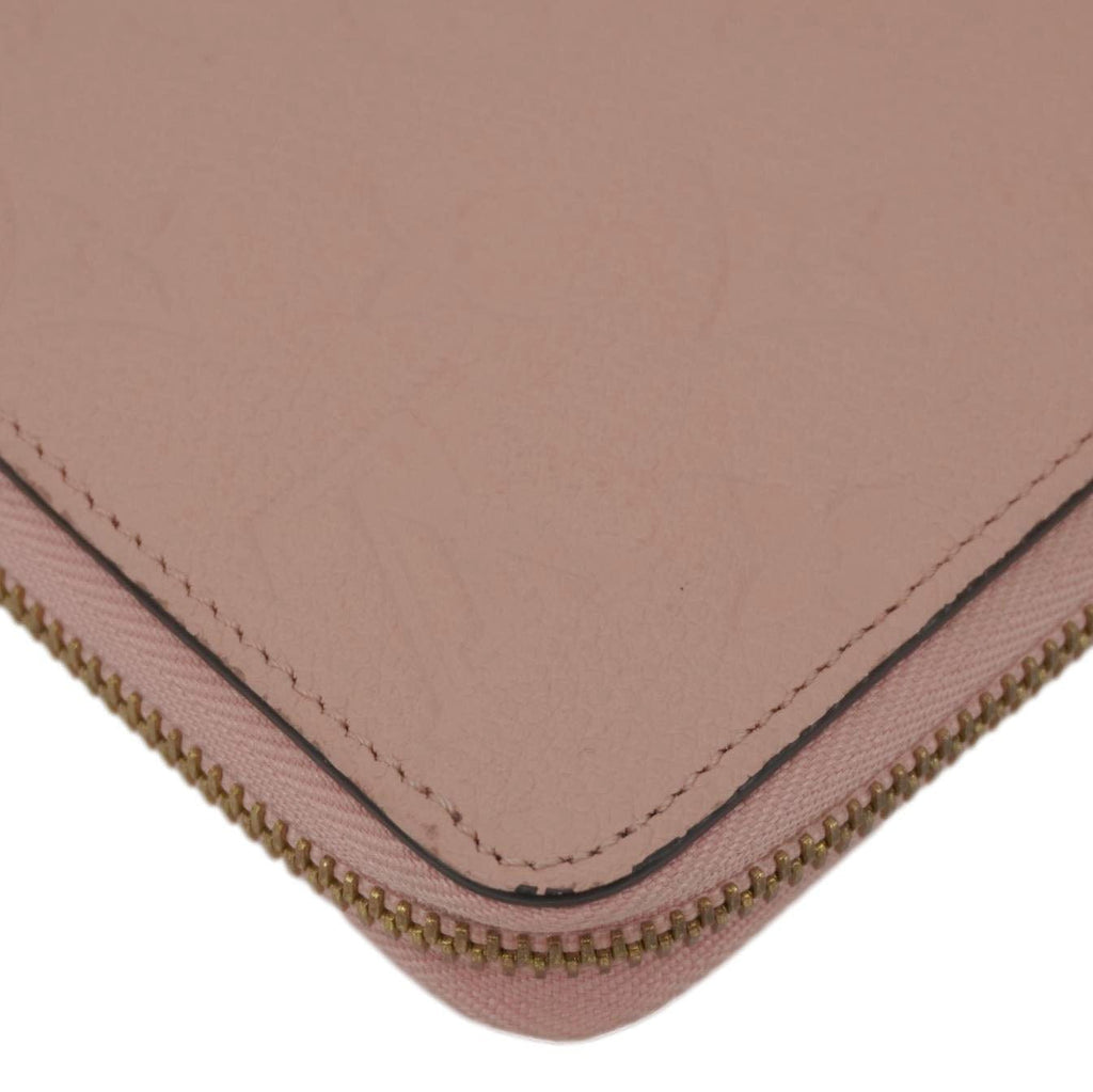 LOUIS VUITTON Monogram Empreinte Leather Zippy Wallet Rose Pink