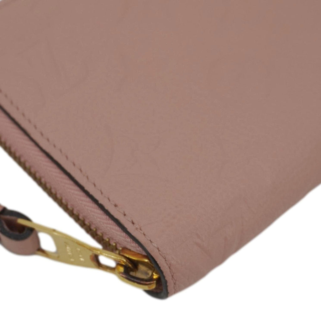 LOUIS VUITTON Monogram Empreinte Leather Zippy Wallet Rose Pink