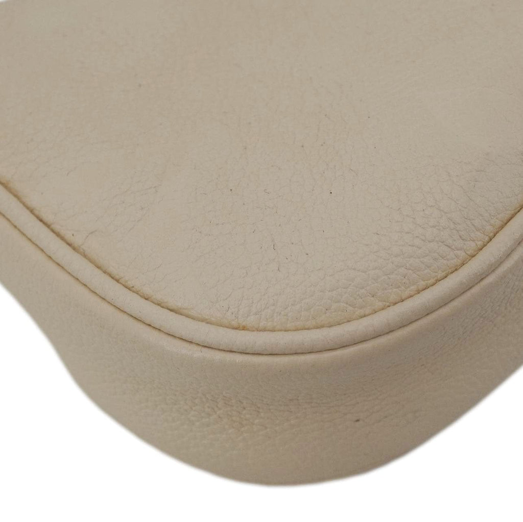 LOUIS VUITTON Moon Mini Monogram Empreinte Leather Hobo Bag Creme