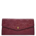 LOUIS VUITTON Sarah Monogram Empreinte Leather Wallet Aurore