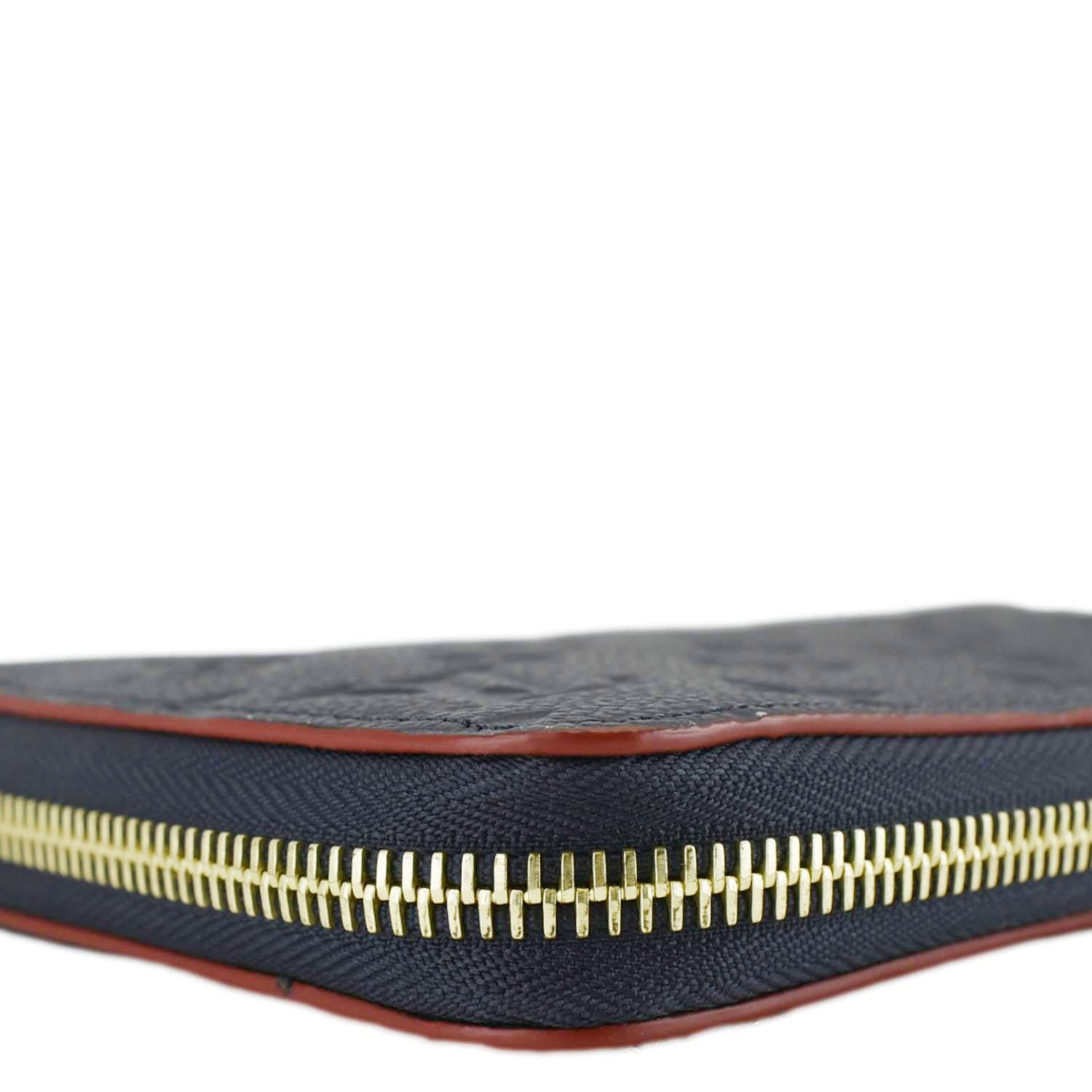 LOUIS VUITTON Clemence Monogram Empreinte Leather Wallet Navy Blue