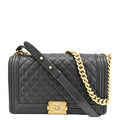 Chanel Medium Boy Flap Caviar Quilted Leather Shoulder Bag Black