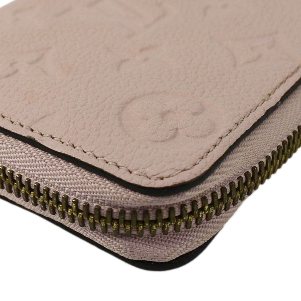 LOUIS VUITTON Monogram Empreinte Leather Zippy Wallet Rose Pink